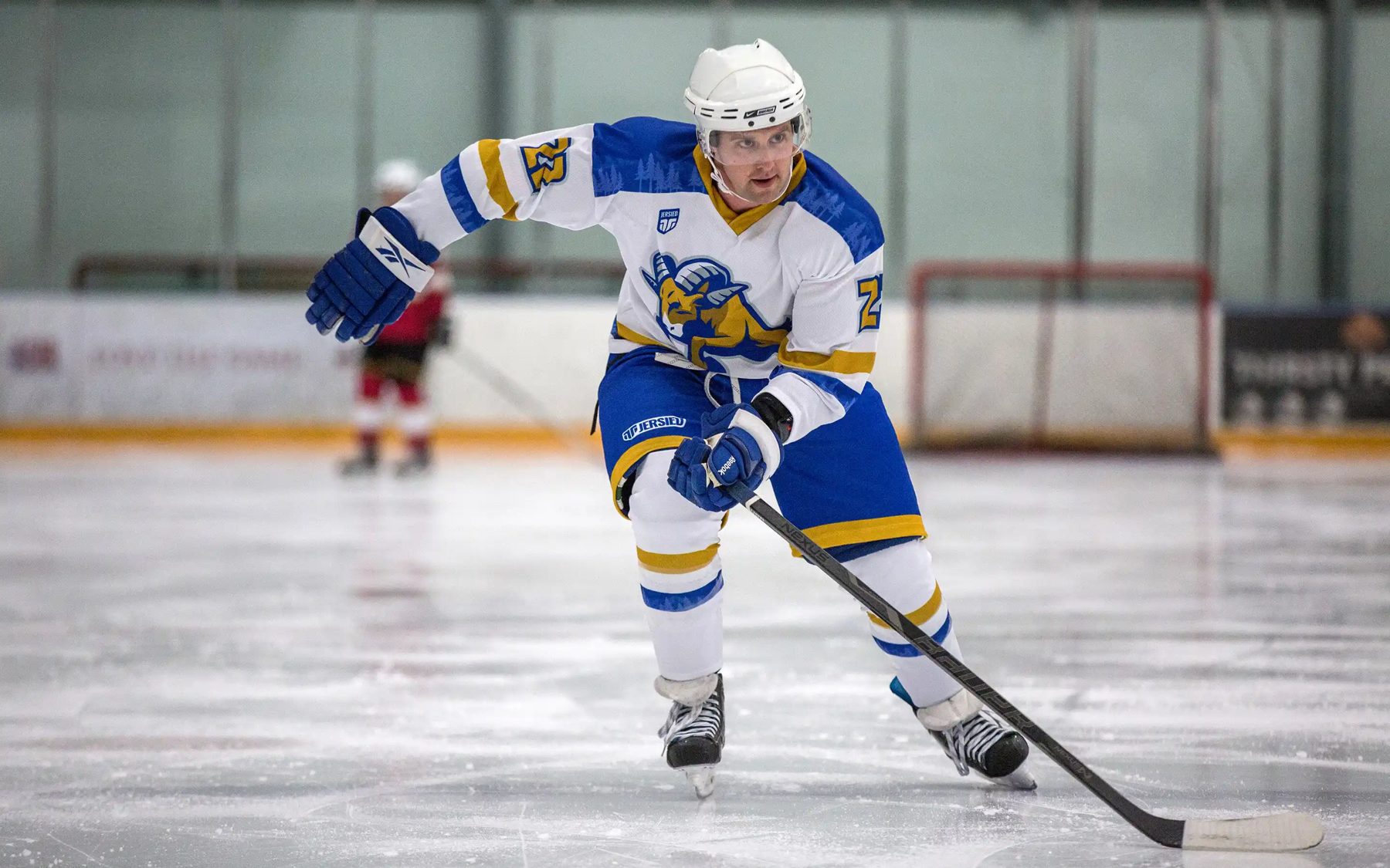 Skater in a white and blue custom jersey
